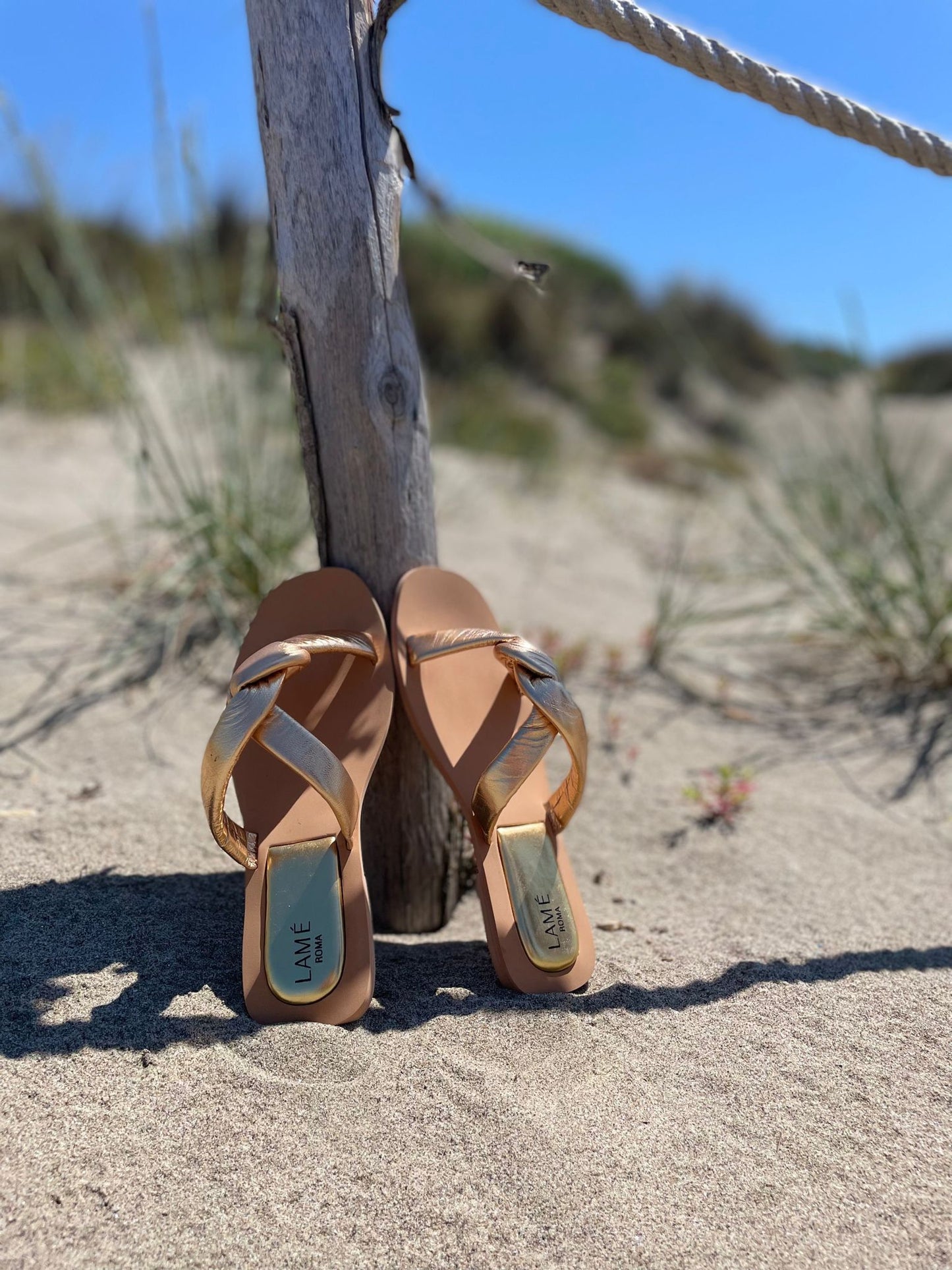 sandali intrecciati oro marca lame'