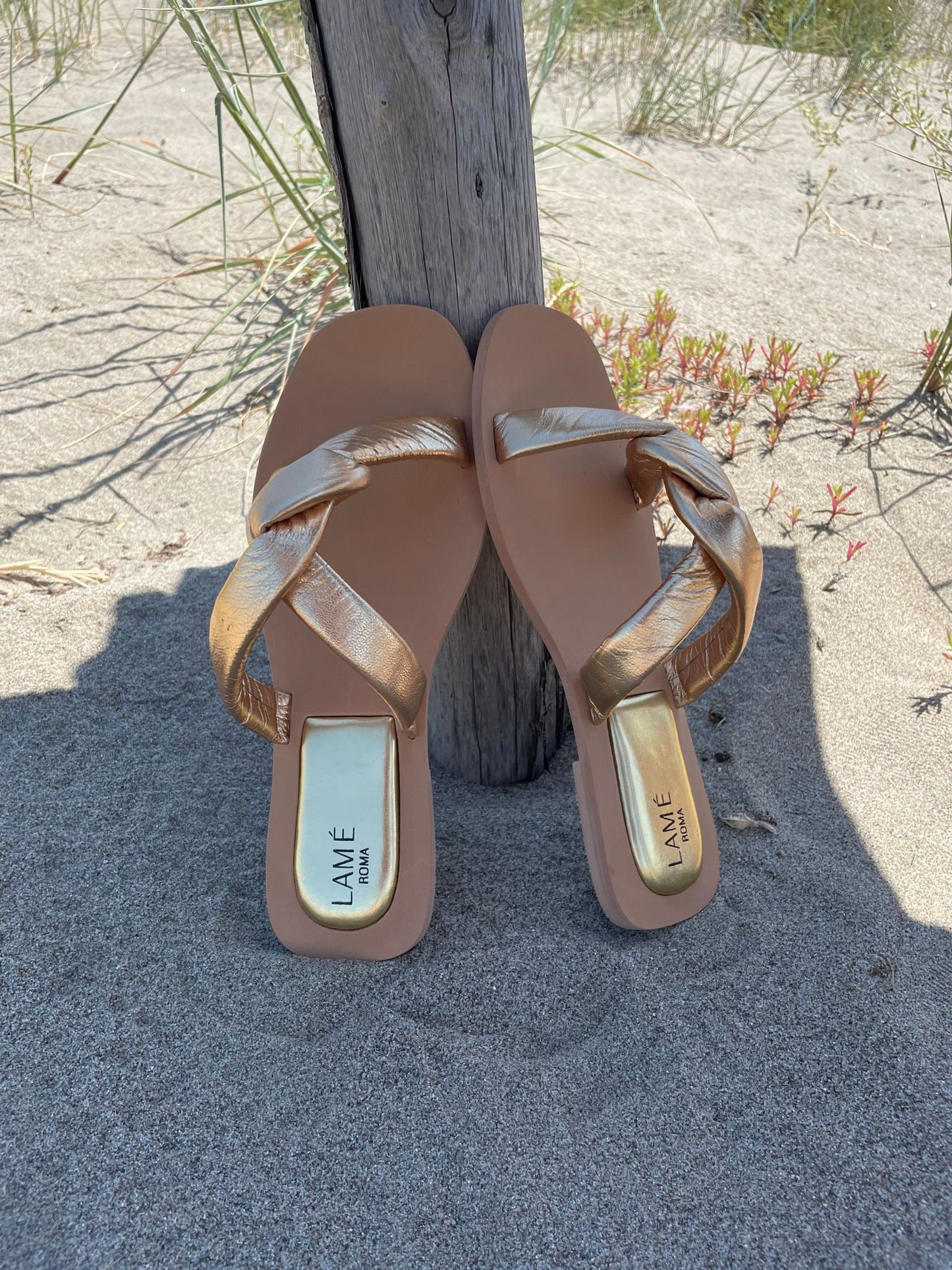 sandali intrecciati oro marca lame'