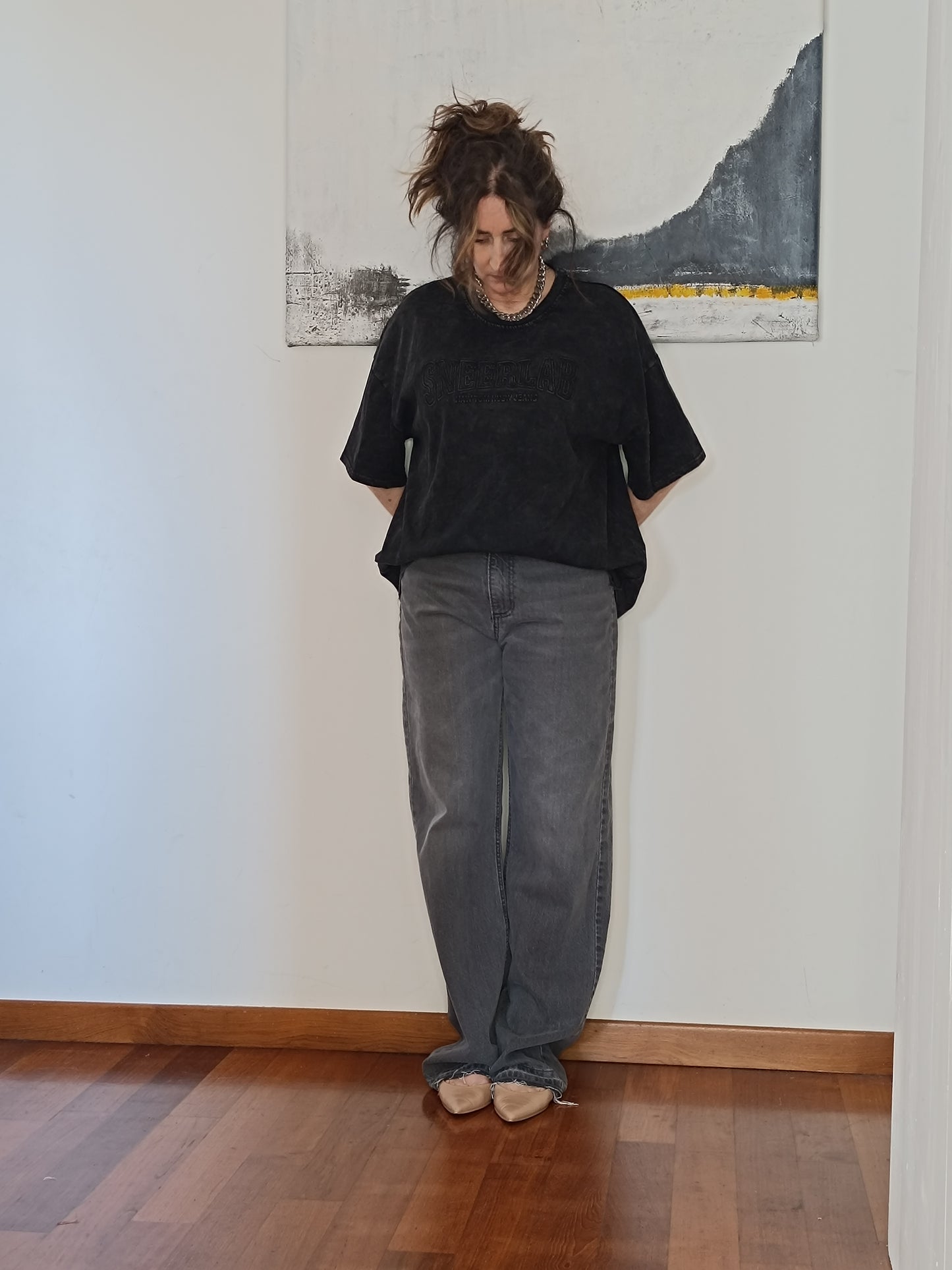 Jeans neri gamba larga